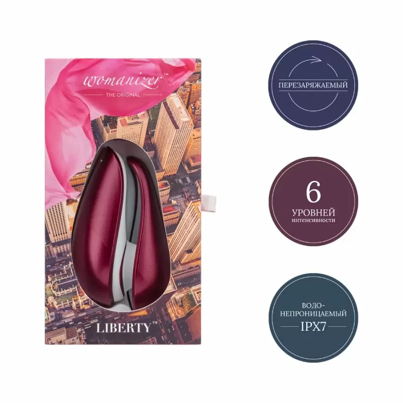 Компактный вакуумный стимулятор клитора Womanizer Liberty - красный